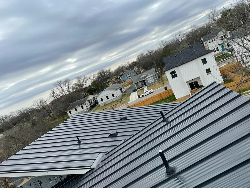 Standing seam metal roof panels with vents for Skylight Repair in Independent Hill